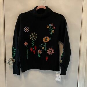 Ladies black turtleneck floral print sweater.  NWT
